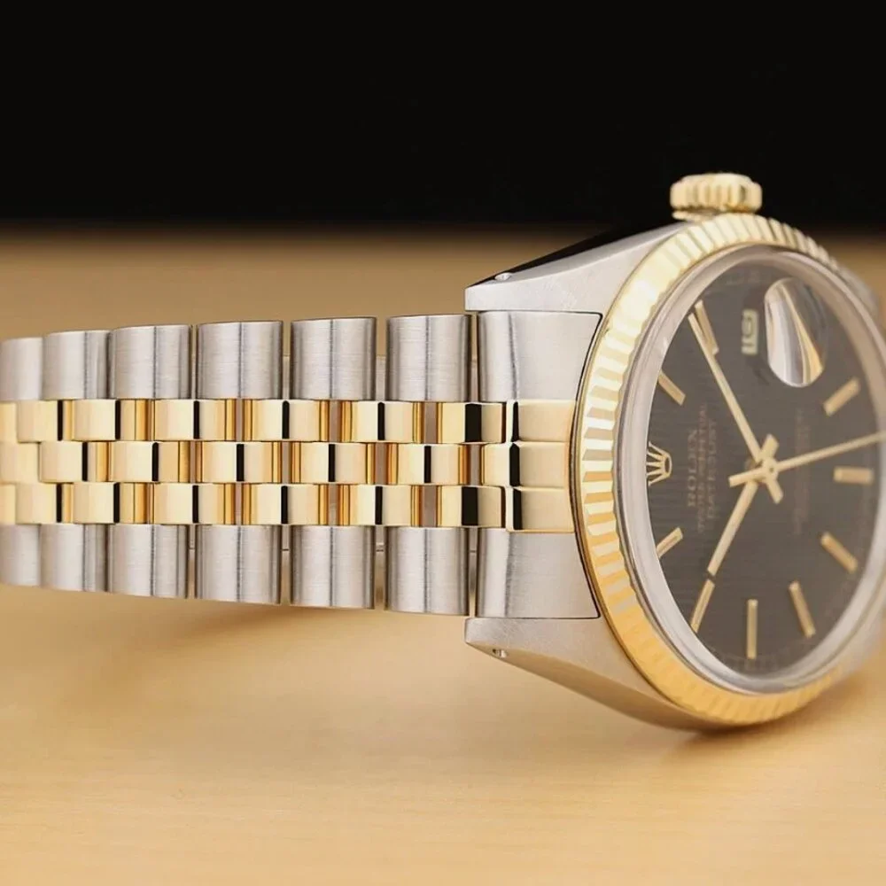 ROLEX MENS DATEJUST BLACK TAPESTRY DIAL 18K YELLOW GOLD STEEL WATCH